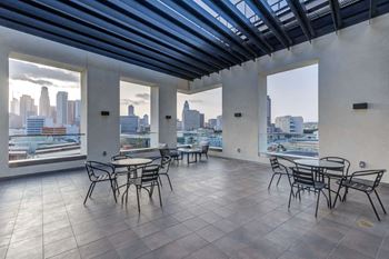 Sky deck with seating area and views of los angeles